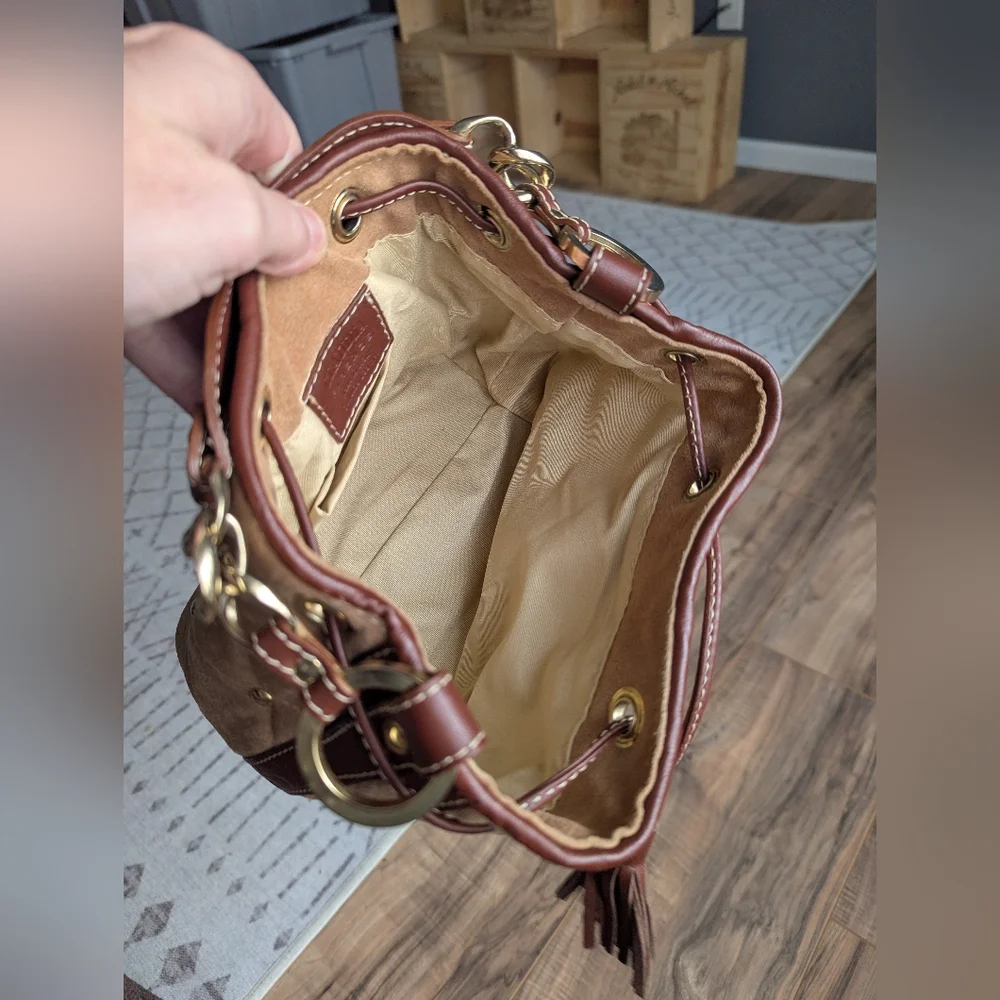 Claudia Firenze Leather Bucket Bag With Pull Top And Tassels.